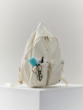 cream backpack photo